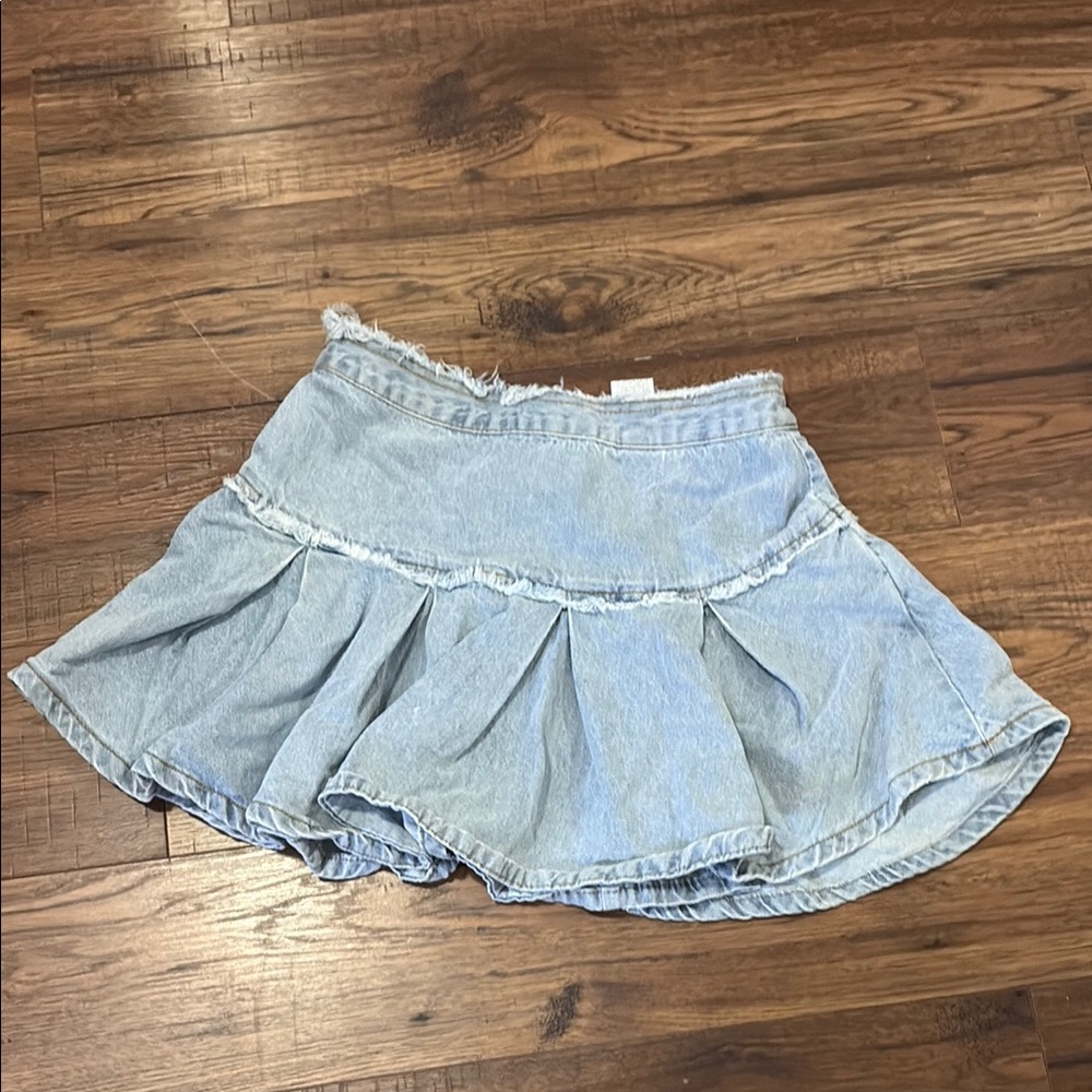 Blue mini skater skirt with ruffled high-low design for casual occasions